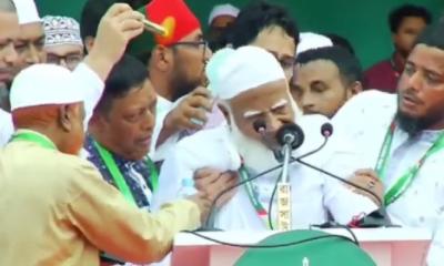 Jamaat chief collapses twice during rally, continues speech while seated